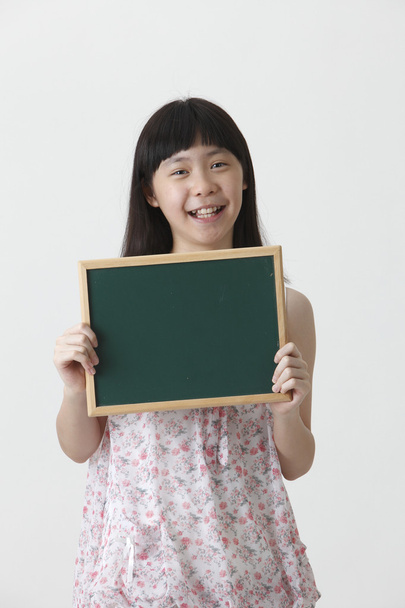 girl holding blackboard - Fotografie, Obrázek