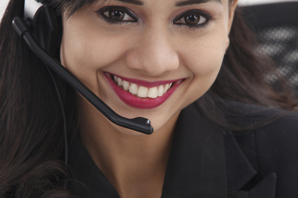 Smiling operator with earphone - Photo, Image