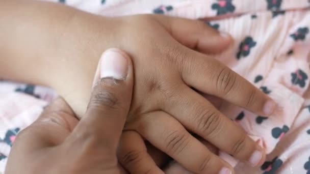 father holding hand of baby child, close up - Footage, Video