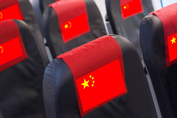 Prázdné místo v letadle s čínskou vlajkou. Cestování, let a doprava v Číně koncept - Fotografie, Obrázek
