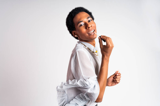 Fluid gender hispanic latin black man posing in studio with fashionable clothing, concepts about LGBTQ, genderless and diversity - Фото, зображення