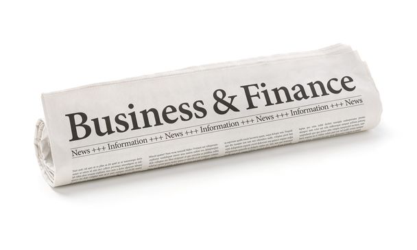 Rolled newspaper with the headline Business and Finance - Photo, Image