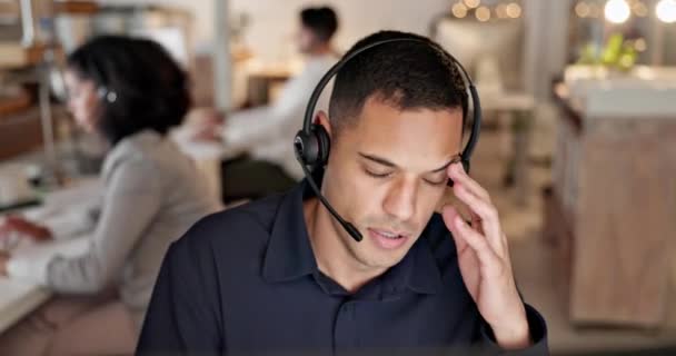 Call center, headache and business man stress, health problem or fatigue with night communication or finance fail. Agent, consultant or sales person with pain or tired for online or financial mistake. - Footage, Video