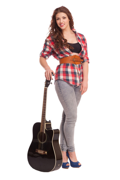 Young female musician with guitar - Фото, зображення