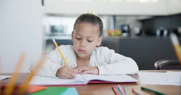 Girl, child and writing in home with homework, learning and notebook for education at dinner table. Student, person and kid with books, pencil and project or homeschool for knowledge and development. - Video, Çekim