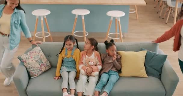 Above, hug and big family on the home sofa for happiness, bonding or to relax together. Smile, love and parents with affection for children on the living room couch for care, conversation and cozy. - Footage, Video