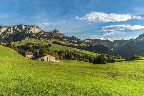 Appenzellerland, landscape with farms and green meadows, view of Hoher Kasten and Kamor in the Alpstein mountains, Bruelisau, Canton Appenzell Innerrhoden, Switzerland - Photo, Image