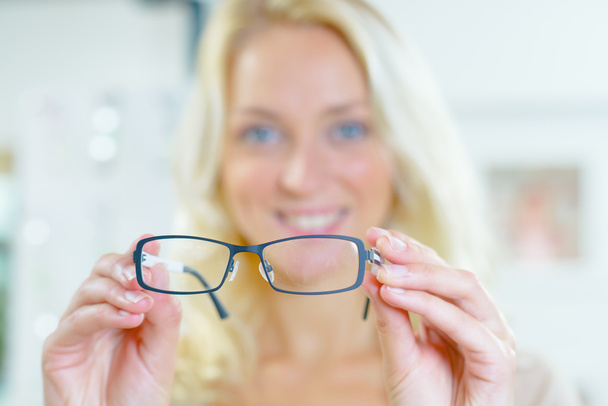 Woman shopping for new glasses - Photo, Image