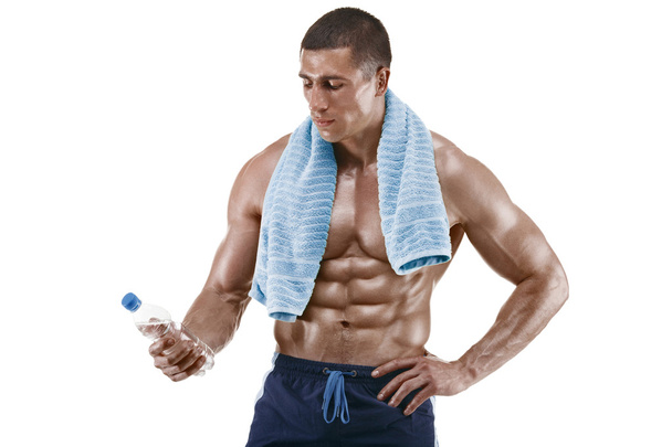 Мускулистый человек с бутылкой воды
. - Фото, изображение