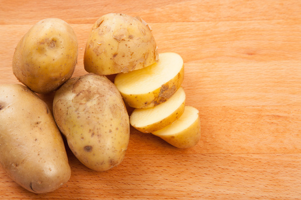 Cut potatoes on cutting board - Photo, image