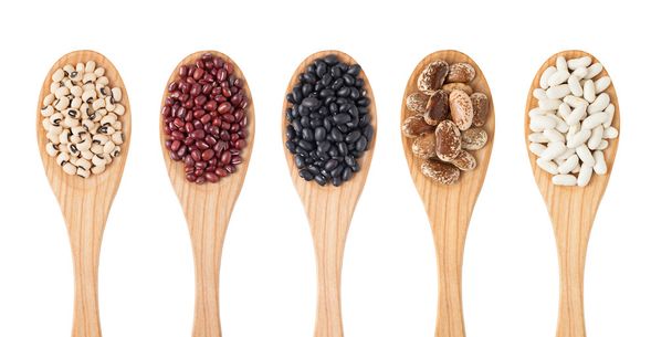 Different sorts of beans on wooden spoon - Photo, Image