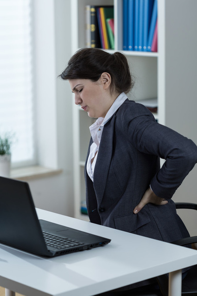 Backache caused by sedenary work - Zdjęcie, obraz