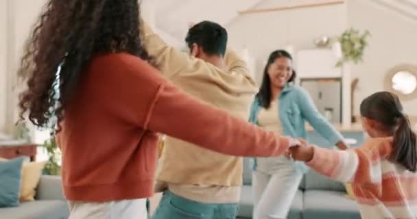 Dancing, circle and kids with parents for activity together with happiness or crazy at laughing at house. Family, energy and children for fun at apartment for entertainment or freedom and goofy - Footage, Video