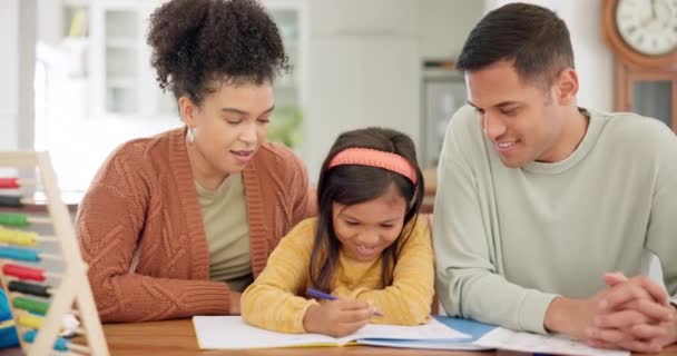 Happy family, learning and parents with girl writing in book for homeschool, math or drawing. Education, father and African mother with child helping with homework, study and teaching for development. - Footage, Video