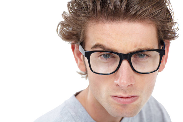 Nerd, portrait or glasses for questions, confused or doubt face expression by white background on studio space. Closeup, man or curious for vision, optometry or fashion frame choice for eyes solution. - Photo, Image