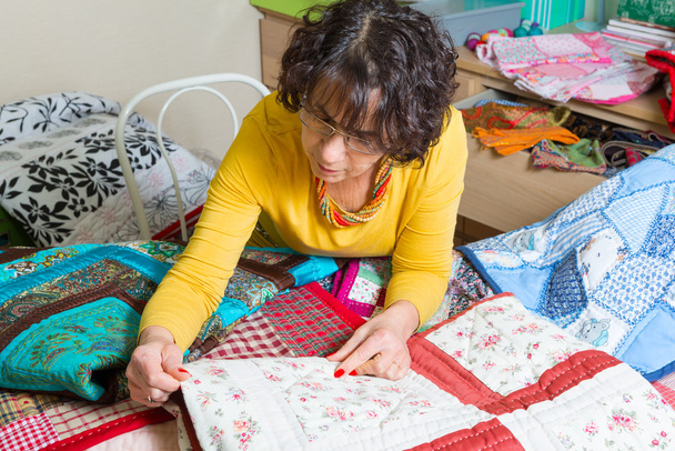 dressmaker working on her patchwork - Photo, Image