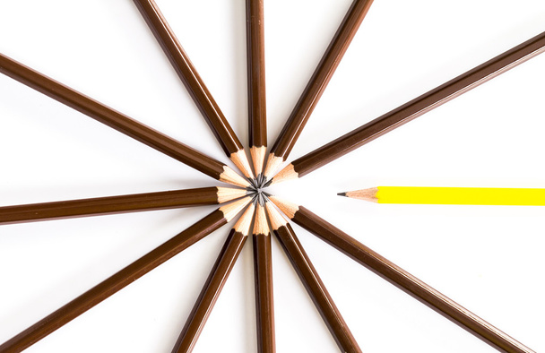 Brown wooden pencil arrange as circular with one of different - Photo, Image