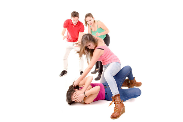 Teenagers bullying a girl - Фото, зображення