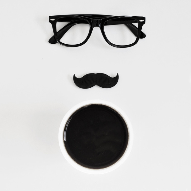 eyeglasses, moustache and cup of coffee - Foto, afbeelding