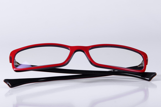 optical red glasses - 写真・画像