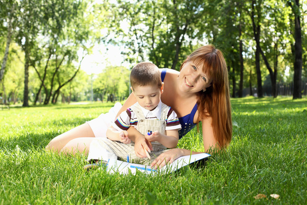 Mother with little son in the park - Photo, Image