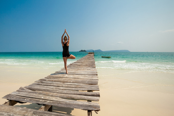 Summer yoga session in beautiful tropical island - Photo, Image