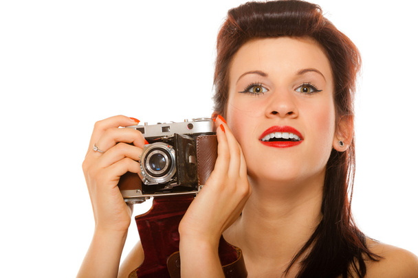 Girl holding  vintage old camera - Foto, Imagen