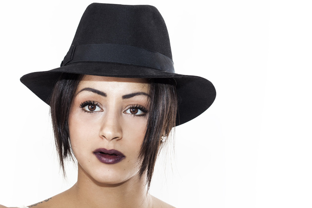 Beautiful woman portrait wearing black hat - Photo, Image