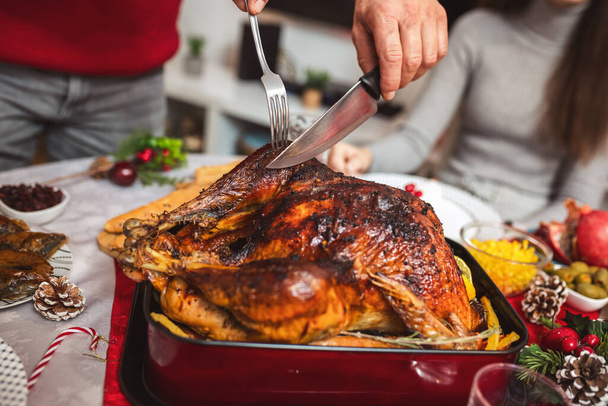 Tasty turkey on the dining table. Family Christmas dinner. - Photo, Image