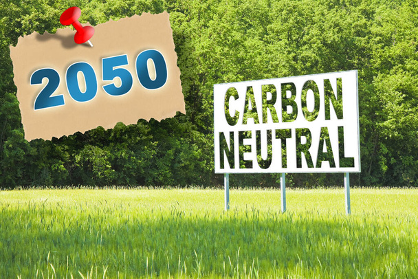CO2 Carbon Neutral concept against an advertising billboard in nature - Εξουδετέρωση άνθρακα 2050 Σύμφωνα με την ευρωπαϊκή νομοθεσία  - Φωτογραφία, εικόνα