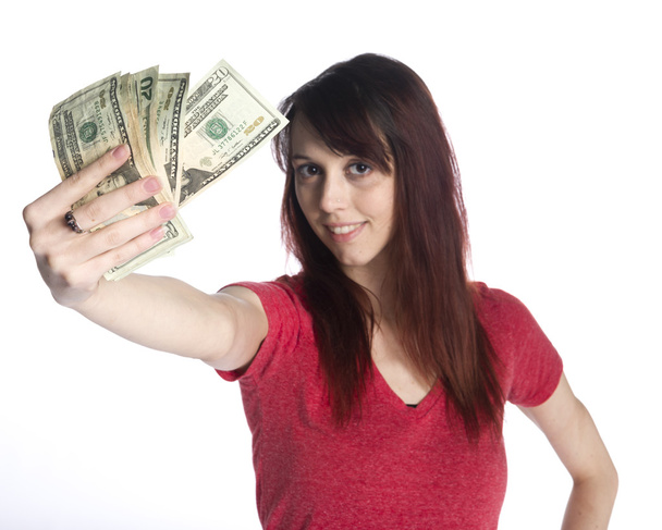 Smiling Woman Holding a Fan of 20 US Dollar Bills - Foto, immagini