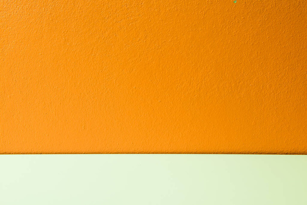 Orange plastering wall with white stripe, Thailand. - Photo, Image