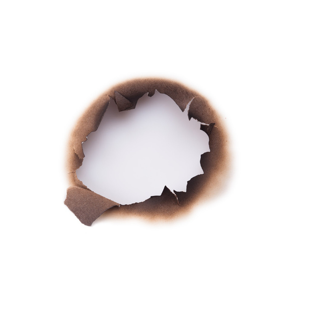 Burned hole in paper - Photo, Image