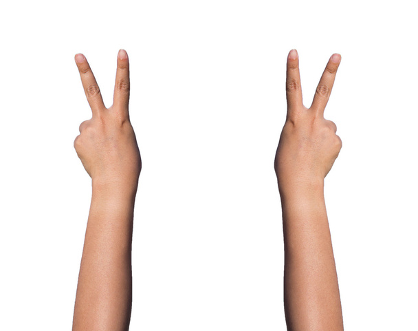τα χέρια σχηματίζουν τον αριθμό 2 στο λευκό φόντο - Φωτογραφία, εικόνα