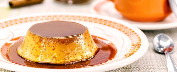 condensed milk pudding with vanilla cream, typical Brazilian sweet. Home made dessert. - Foto, imagen