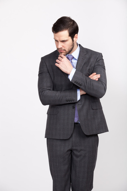 handsome office business man with beard dressed in elegant suit, - Fotó, kép