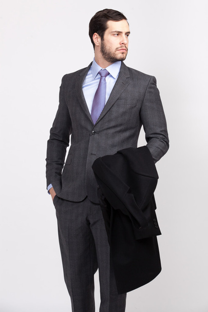 homem de negócios bonito escritório com barba vestida com terno elegante
, - Foto, Imagem