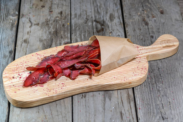 basturma dried meat on a wooden board - Photo, Image