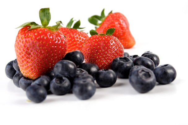Fresh Blueberries and strawberries - Photo, image