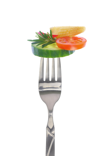 Fresh colorful vegetables on fork, isolated on white - Foto, Imagen