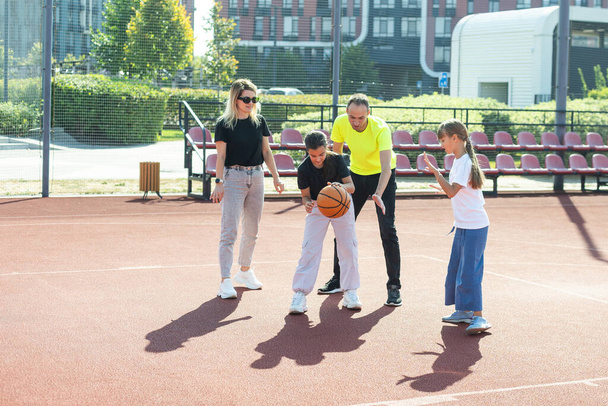 Time for family basketball. Family at basket playground. . High quality photo - Photo, Image