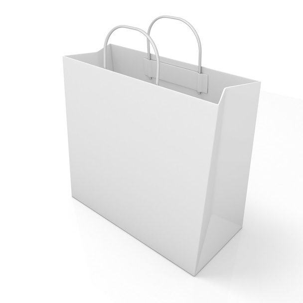 Empty shopping paper bag, isolated on white. Side view - Foto, imagen