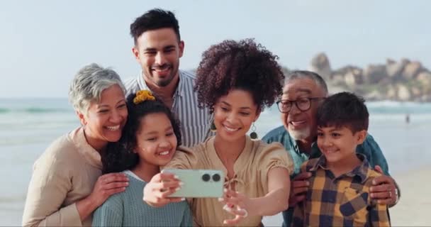 Big family selfie, grandparents or happy kids in beach, sea or ocean on holiday vacation together. Mom, dad or children taking pictures to relax for love or online photo with grandma or grandfather. - Footage, Video