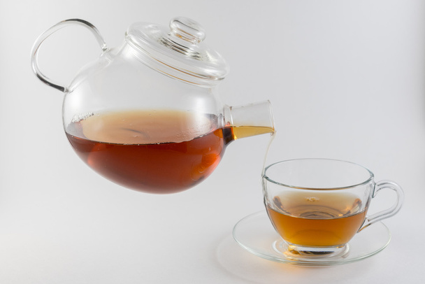 Flying teapot pours tea 14 - Foto, afbeelding