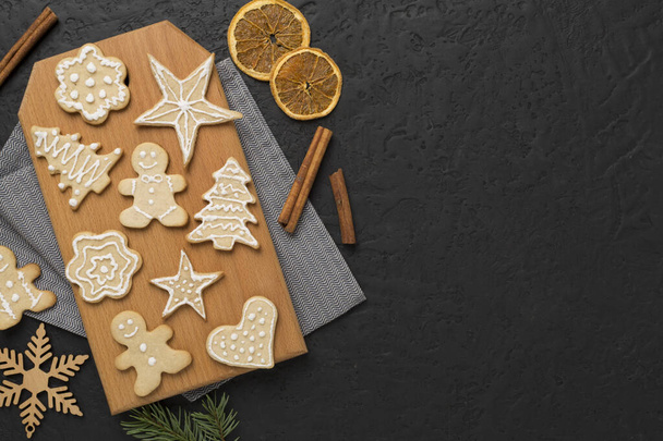 Flat lay with cute homemade Christmas cookies on concrete background,top view - Valokuva, kuva