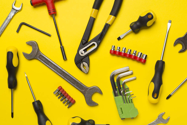 Set of tools on color background, top view - Photo, Image