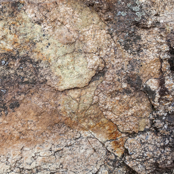 Natural granite stone texture background. Rough and rusty. Close-up - Photo, Image