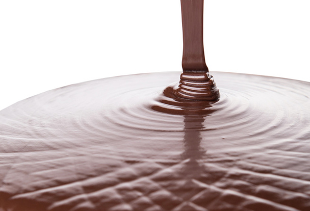 Verter líquido de chocolate caliente
 - Foto, Imagen
