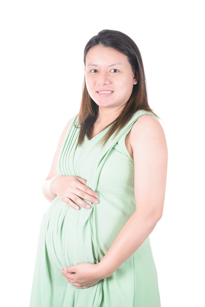 Terhes nő ölelést ő meztelen paunch hasa első nyolc hónapban - Fotó, kép