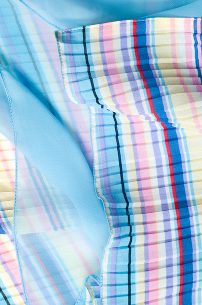 Плісе з тканини. Сині жовті червоні білі смуги текстури
 - Фото, зображення